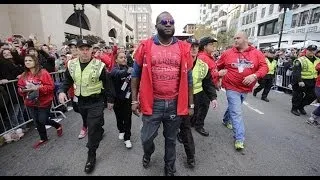 David Ortiz crosses the Boston Marathon finish line