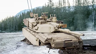 Recovering 70 Ton US M1 Abrams Tank Stuck in Icy Mud