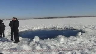 Russia cleans up after meteor strike