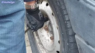 Putting the spare tyre on a Citroen Berlingo Car Derived Van Tyre Change UK