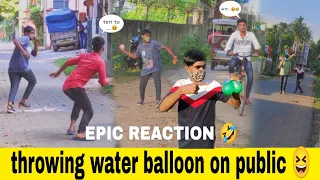 Throwing water balloon 🎈at people prank 😂|| funny reaction 🤣|| prankstar razz