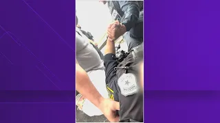 VIDEO: Texas man pulls injured police officer to safety