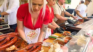 Street Food in Bucharest, Romania. Girls Prepare Sandwiches Stuffed with Sausage and Meat