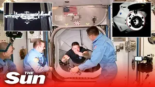 SpaceX's Crew Dragon Capsule docks at the ISS and NASA crew are welcomed in after 'slick' flight