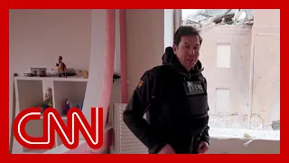 CNN reporter shows grim site of family's home hit by airstrike