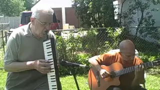 Besame Mucho (performed by Heinz Lutz and Nephtali Santiago)