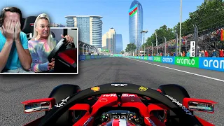 Girlfriend tries F1 racing simulator..
