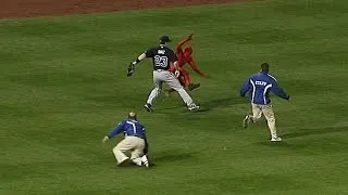 Diaz helps security apprehend fan on field