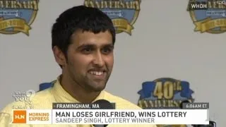 Man loses girlfriend, wins lottery!