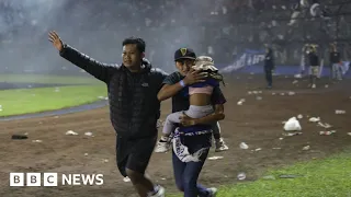 Scores killed in Indonesia football stadium crush - BBC News