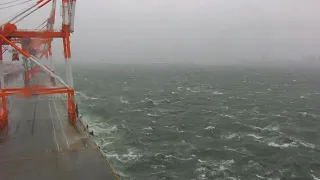 View from Japan's Kobe port as typhoon Lan moves inland | AFP