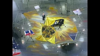 "The James Webb Space Telescope fully deployed orbiting the Sun, painted by George W Bush"