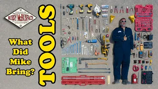 What Tools Does Mike Bring on the Bus?