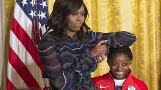 Michelle Obama Says She’s Rooting for Simone Biles