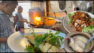 吉隆坡一家30年历史的港式海鲜粥，以鸡汤打底，鲜香顺滑，白斩鸡更是一绝……