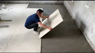 Professional Living Room Floor Construction Techniques Using Large Size Ceramic Tiles 100 x 100 cm