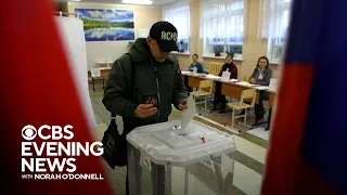 Russians vote in presidential election, Putin all but assured another term