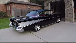 Dad Backs 57 Chevy Out of Garage