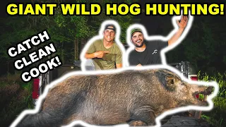 Hunting the WORLD's LARGEST Wild Hogs at NIGHT!!! (OPEN FIRE Catch Clean Cook)
