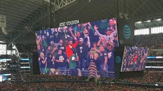 "Clark" the Bald Eagle lands on a fan at the Cotton Bowl