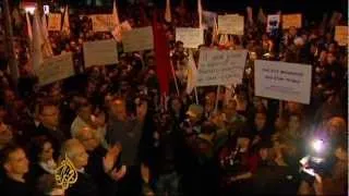 Cyprus to reopen banks amid protests
