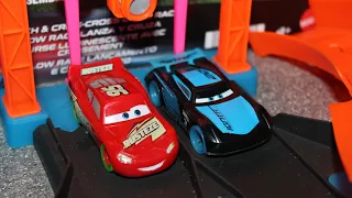 Mattel Disney Cars Glow Racers Launch & Criss-Cross Track Playset - Lightning McQueen, Jackson Storm