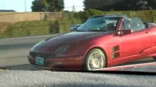 Qvale Mangusta on the Freeway