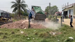 Bulldozer opening nice new project pushing land