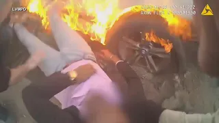 Body cam video shows moment officer, bystander rescue man from burning car on Las Vegas Strip