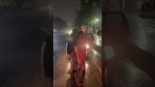 Couple dancing in the rain in Dhaka, Bangladesh | Kodom