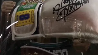 Manny Pacquiao signed/framed boxing glove on display at Worldwide Signings