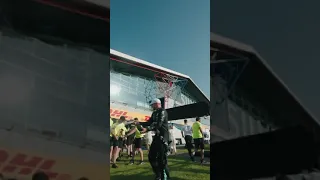 Mercedes team celebrating after winning in Silverstone