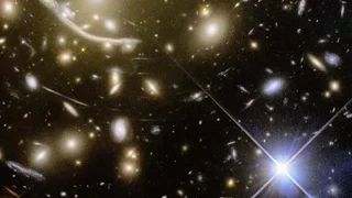 Hubble Uses ’Super Vision’ on Galaxy Cluster - STScI Astronomer