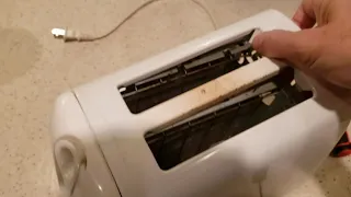 Fix Toaster that won't stay down.