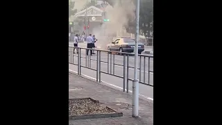 Car is on fire but the extinguisher flies away!