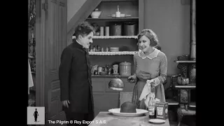 Charlie Chaplin "helping" in the kitchen - The Pilgrim