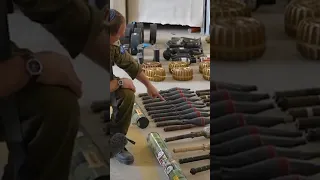 Israel’s military shows cache of weapons it says were seized by Hamas #shorts