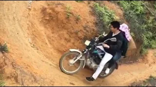 Girls Ride Bikes On Hills at Dangerous Track