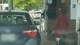 Girl keeps pulling up to gas pump on wrong side and tries to play it off.