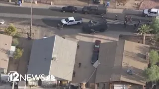 Suspect arrested after shooting involving police, carjacking in Phoenix
