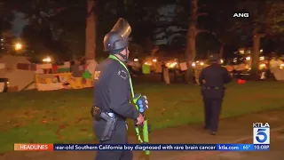 Police clear protest encampment at USC