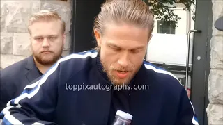 Charlie Hunnam signs autographs for TopPix