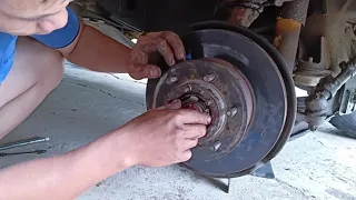 Replace and adjust Toyota SR Front Wheel Bearing