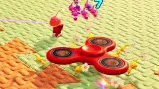 pikmin dragging a fidget spinner back to the base in pikmin 4