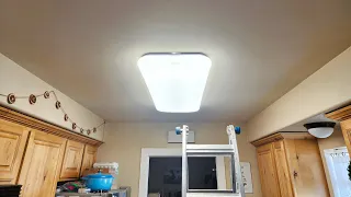 Installing a new light in the kitchen.
