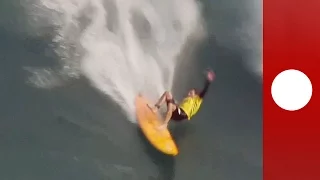Surfers take on epic 50ft waves at 'Jaws', multiple wipeouts, Hawaii