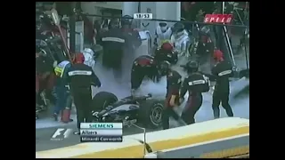 2005 F1 Japanese GP - Christijan Albers (Minardi) pit stop fire, view from track