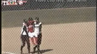 Softball player carried around bases by opponents