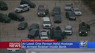 Suspected Bank Robber Holding At Least One Hostage