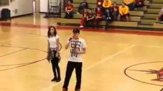 Rapper preforms at High School pep rally